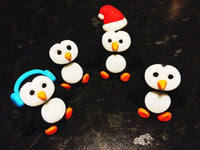 Edible penguin set x4 Christmas cake topper decorations