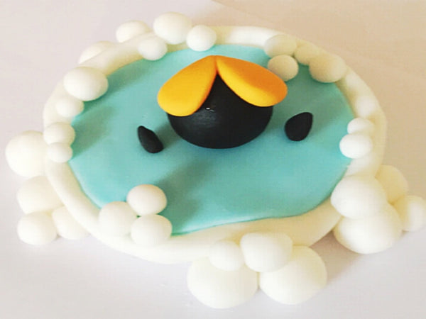 Edible penguin in pond cake topper decoration