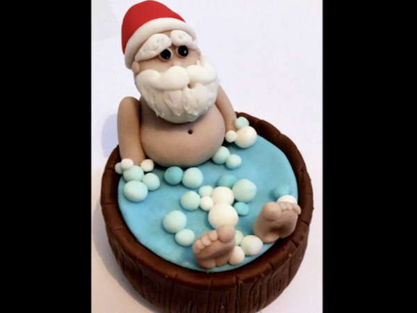 Edible Santa in hot tub cake topper